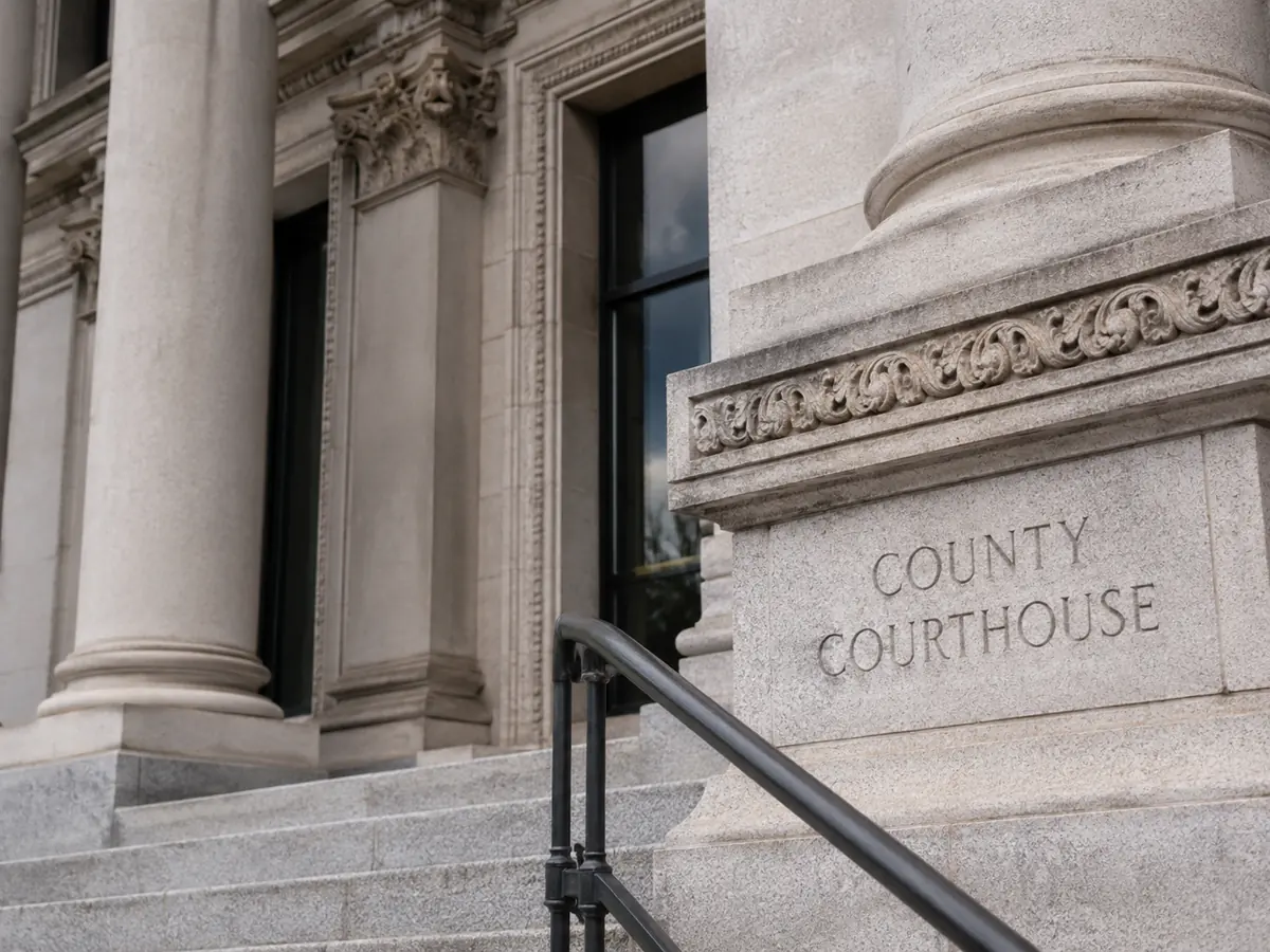 The stone entrance of a county courthouse